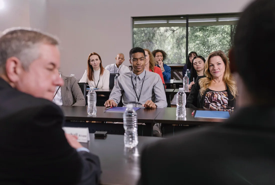 Professional people in a congress venue planning setting