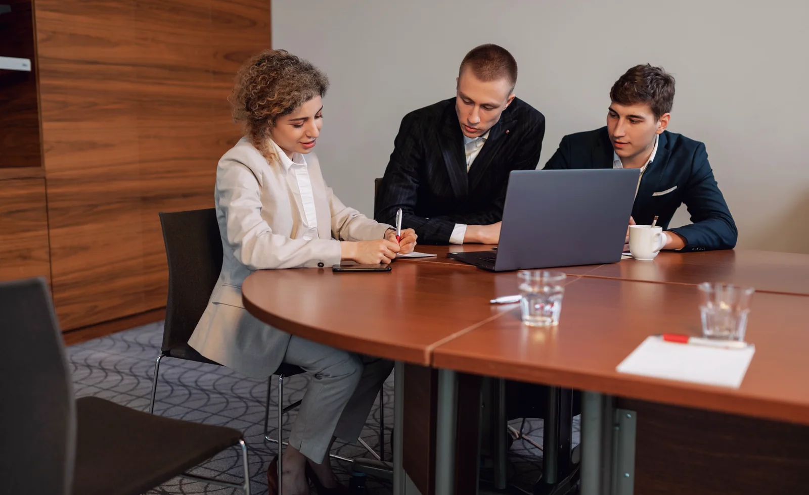 Business professionals at a congress planning venue